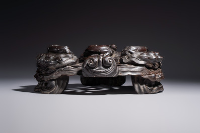 Two large Chinese carved wooden stands, 19th C.