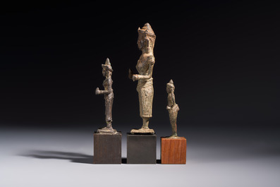 Five bronze figures of divinities, probably Cambodia, 12/13th C.