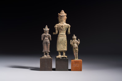 Five bronze figures of divinities, probably Cambodia, 12/13th C.