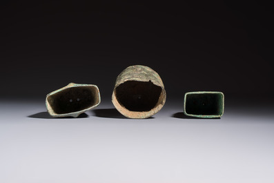 Seven various Chinese bronze and cast-iron bells, Han and later