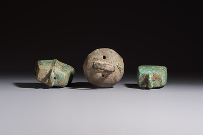 Seven various Chinese bronze and cast-iron bells, Han and later