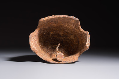 Seven various Chinese bronze and cast-iron bells, Han and later