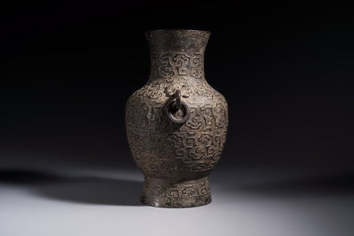 A Chinese archaistic bronze vase with Taotie handles, 'Hu 壺', Ming