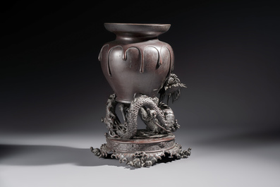 A Japanese bronze vase carried by a dragon, Meiji, 19th C.
