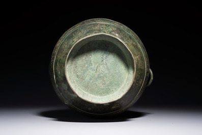 An extremely rare Chinese archaic bronze wine vessel, 'Hu 壺', Warring States period