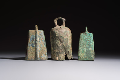 Seven various Chinese bronze and cast-iron bells, Han and later