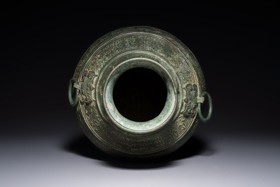An extremely rare Chinese archaic bronze wine vessel, 'Hu 壺', Warring States period