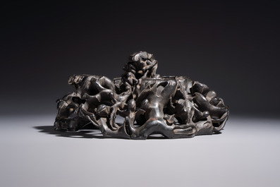 Two large Chinese carved wooden stands, 19th C.