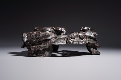 Two large Chinese carved wooden stands, 19th C.