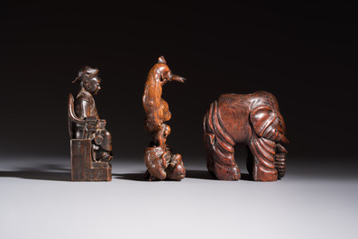 A group of 11 Chinese carved bamboo and wooden works, 19/20th C.