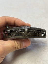 A Chinese openworked double-walled lozenge-shaped bronze water dropper, Ming