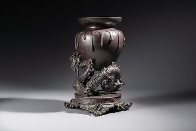 A Japanese bronze vase carried by a dragon, Meiji, 19th C.