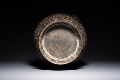 A Chinese archaistic bronze vase with Taotie handles, 'Hu 壺', Ming