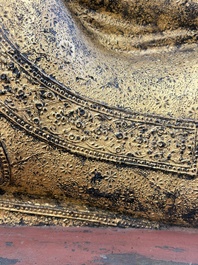 An exceptional and large gilt-lacquered bronze figure of the reclining Parinirvana Buddha, Thailand, 18th C.