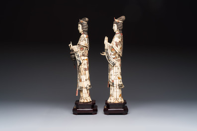 A pair of Chinese polychromed carved bone figures of divinities, 20th C.