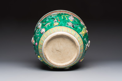 A Chinese famille rose green-ground 'Antiquities' fish bowl or jardini&egrave;re with applied relief design, 19th C.