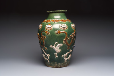 A Chinese sancai-glazed martaban with relief design, 19th C.