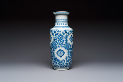 A Chinese blue and white rouleau vase with floral design, Kangxi