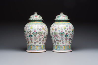 A pair of Chinese famille rose 'Antiquities' covered vases and a dish, 19th C.