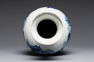 A Chinese blue and white 'Mountainous Riverscape' baluster vase, Kangxi