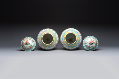 A pair of Chinese famille rose 'Antiquities' covered vases and a dish, 19th C.