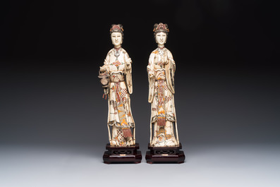 A pair of Chinese polychromed carved bone figures of divinities, 20th C.