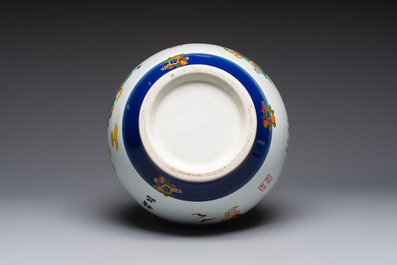 A large Chinese polychrome-decorated blue-ground double-gourd vase, 20th C.