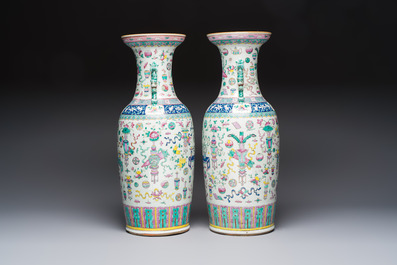 A pair of Chinese famille rose 'Antiquities' vases, 19th C.