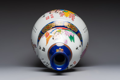 A large Chinese polychrome-decorated blue-ground double-gourd vase, 20th C.