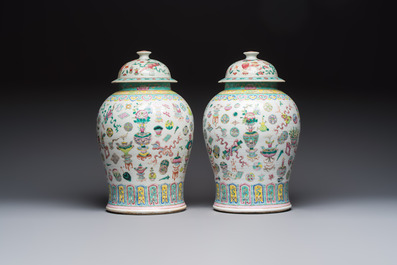 A pair of Chinese famille rose 'Antiquities' covered vases and a dish, 19th C.