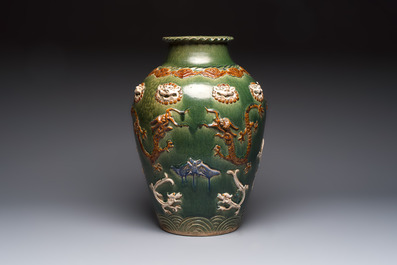 A Chinese sancai-glazed martaban with relief design, 19th C.