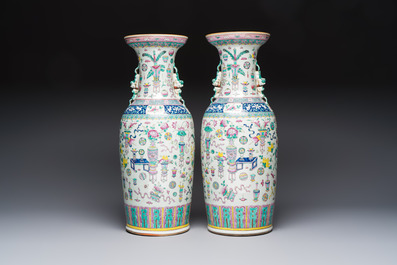 A pair of Chinese famille rose 'Antiquities' vases, 19th C.