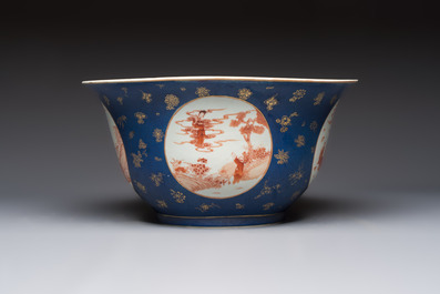 A large Chinese iron-red and gilt-decorated powder-blue-ground bowl with narrative design, 19th C.