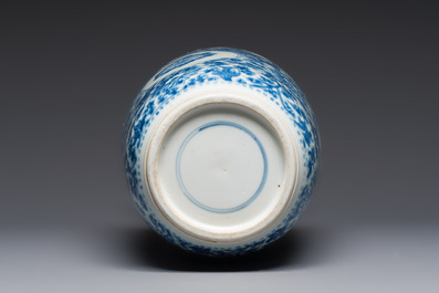 A Chinese blue and white rouleau vase with floral design, Kangxi