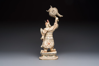 A Chinese polychromed carved bone figure of a warrior raising a tripod censer, 20th C.
