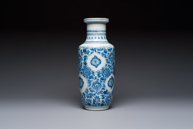 A Chinese blue and white rouleau vase with floral design, Kangxi