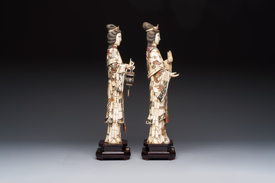 A pair of Chinese polychromed carved bone figures of divinities, 20th C.