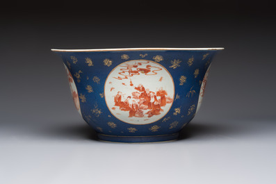 A large Chinese iron-red and gilt-decorated powder-blue-ground bowl with narrative design, 19th C.