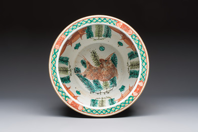 A Chinese famille rose green-ground 'Antiquities' fish bowl or jardini&egrave;re with applied relief design, 19th C.