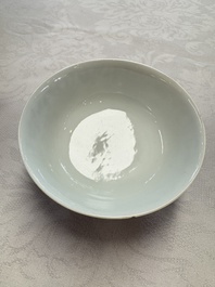 A pair of Chinese blue and white 'lotus scroll' bowls, Yongzheng mark and of the period