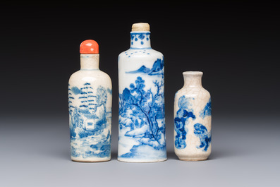 Three Chinese blue and white snuff bottles with landscapes and 'Buddhist Lions', Yongzheng marks, 19th C.
