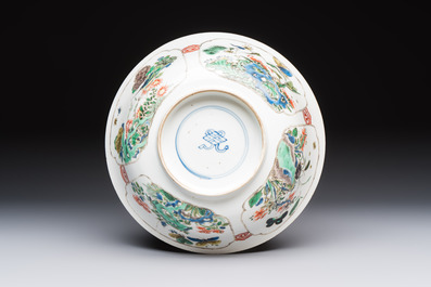 A Chinese famille verte bowl with bird and butterflies among flowers, lozenge mark, Kangxi