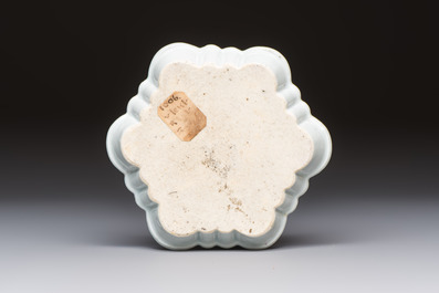 A Chinese famille rose ruby-ground 'Landscape Scroll' teapot and stand, Yongzheng