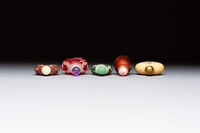 Five various Chinese cloisonn&eacute;, glass, horn and enamel snuff bottles, Qianlong mark, 19/20th C.