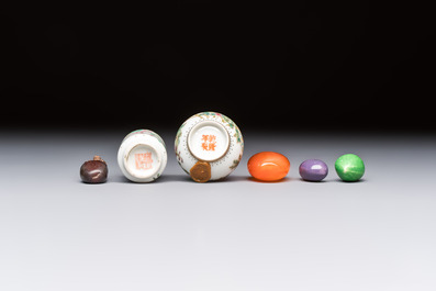 A group of four Chinese porcelain and agate snuff bottles, a miniature vase and a carved seed, Yongzheng and Qianlong marks, 19/20th C.