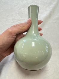 A pair of Chinese celadon-glazed bottle vases with incised phoenix design, Yongzheng mark, 19th C.