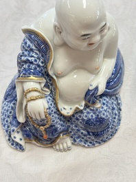 A Chinese blue and white, iron-red and gilt-decorated Milefo Buddha, Fu Jian Hui Guan 福建會館 and You Lin Ji Zhi 游林記製 marks, 20th C.