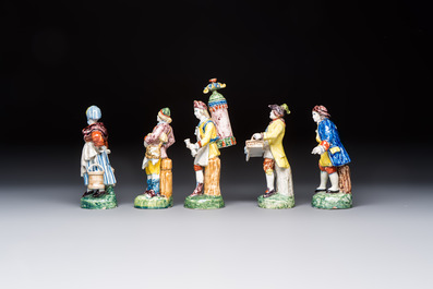 Five polychrome Delftware models of figures from everyday life, probably Desvres, France, 19th C.