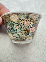 A fine Chinese famille rose gilt-decorated 'Elegant Beauty' cup and saucer, Yongzheng