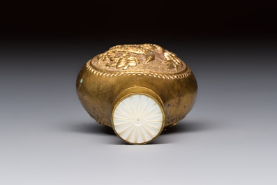A Chinese gilt-bronze and mother-of-pearl-inlaid snuff bottle with birds among flowering branches, Guangxu mark and of the period